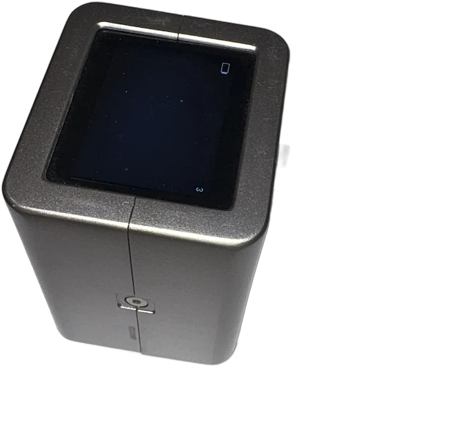 The NovaVera handheld imager, a compact silver unit with a color screen